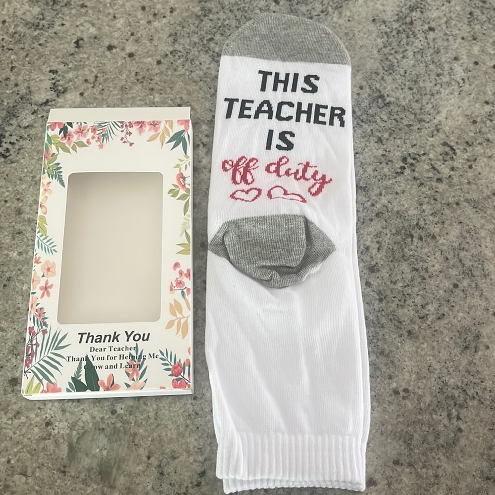 NEW white socks that reads, “This teacher is off duty”